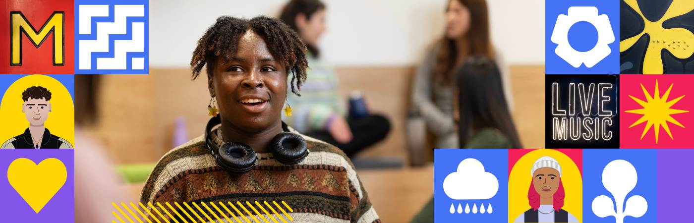 Student with headphones smiling