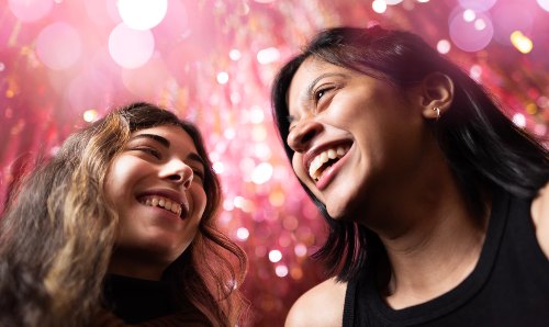 Two girls laughing